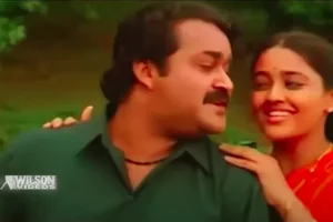 Thaimavin Thanalil Lyrics