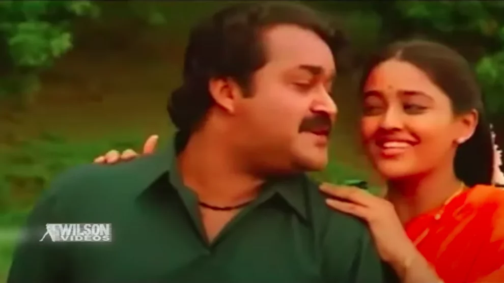 Thaimavin Thanalil Lyrics