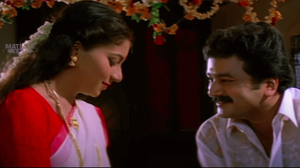 Manassil Kuliru Korum Lyrics