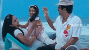 Neeyam Thanalinu Thazhe Lyrics